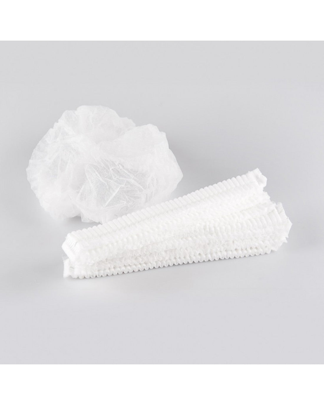 Белые, гофрированные, одноразовые шапочки из нетканого материала 100 шт.